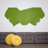 green laser cut felt wall hanging by design and conquer above couch